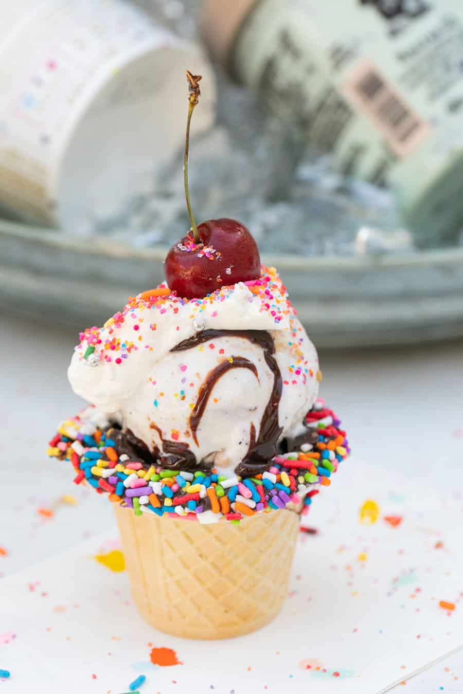 Mini ice cream sundae with a cherry on top. 