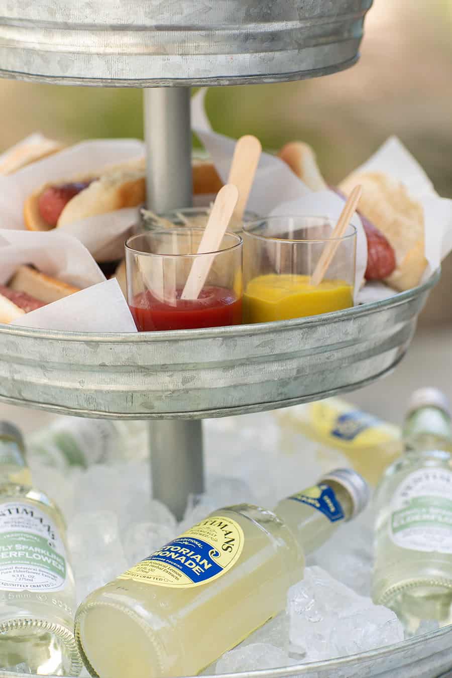 Tiered Galvanized Tray with ketchup and mustard 