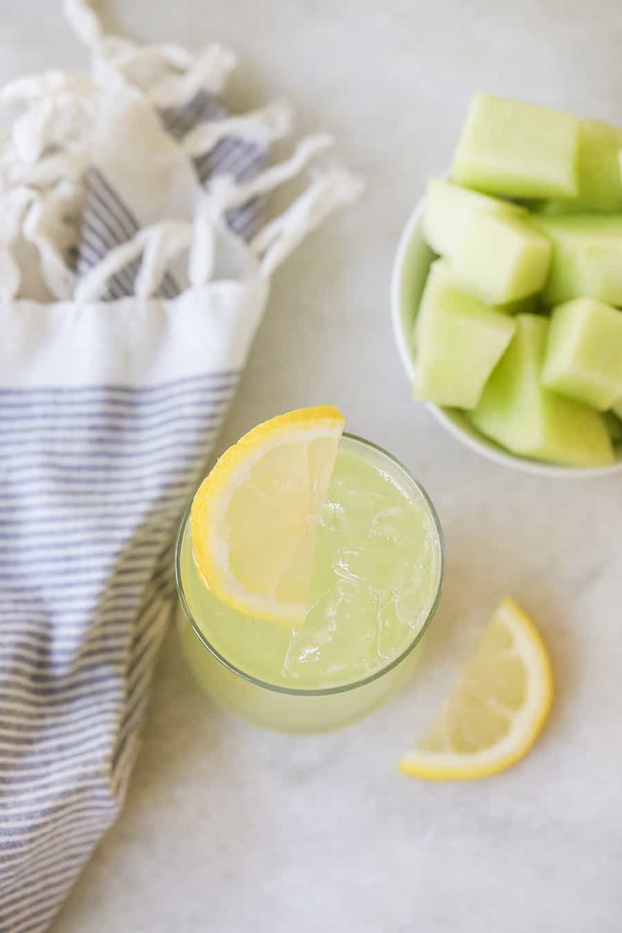 lemonade in a glass with a lemon slice.