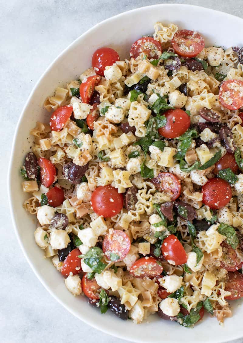 Summer Pasta Salad Recipe with tomatoes, olives, garlic, cheese and basil.