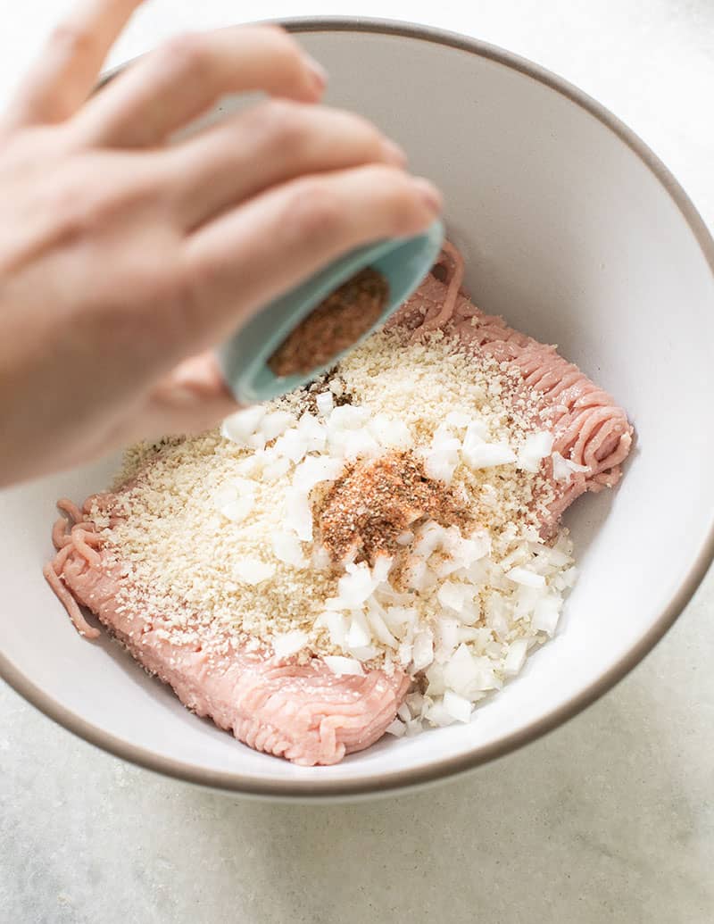 Ingredients for making turkey meatballs. 