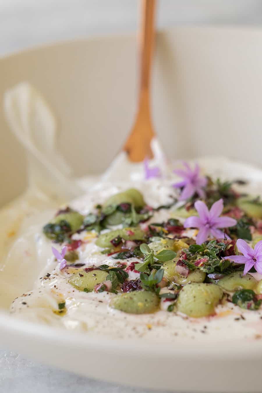 Yogurt with lima beans and toppings.