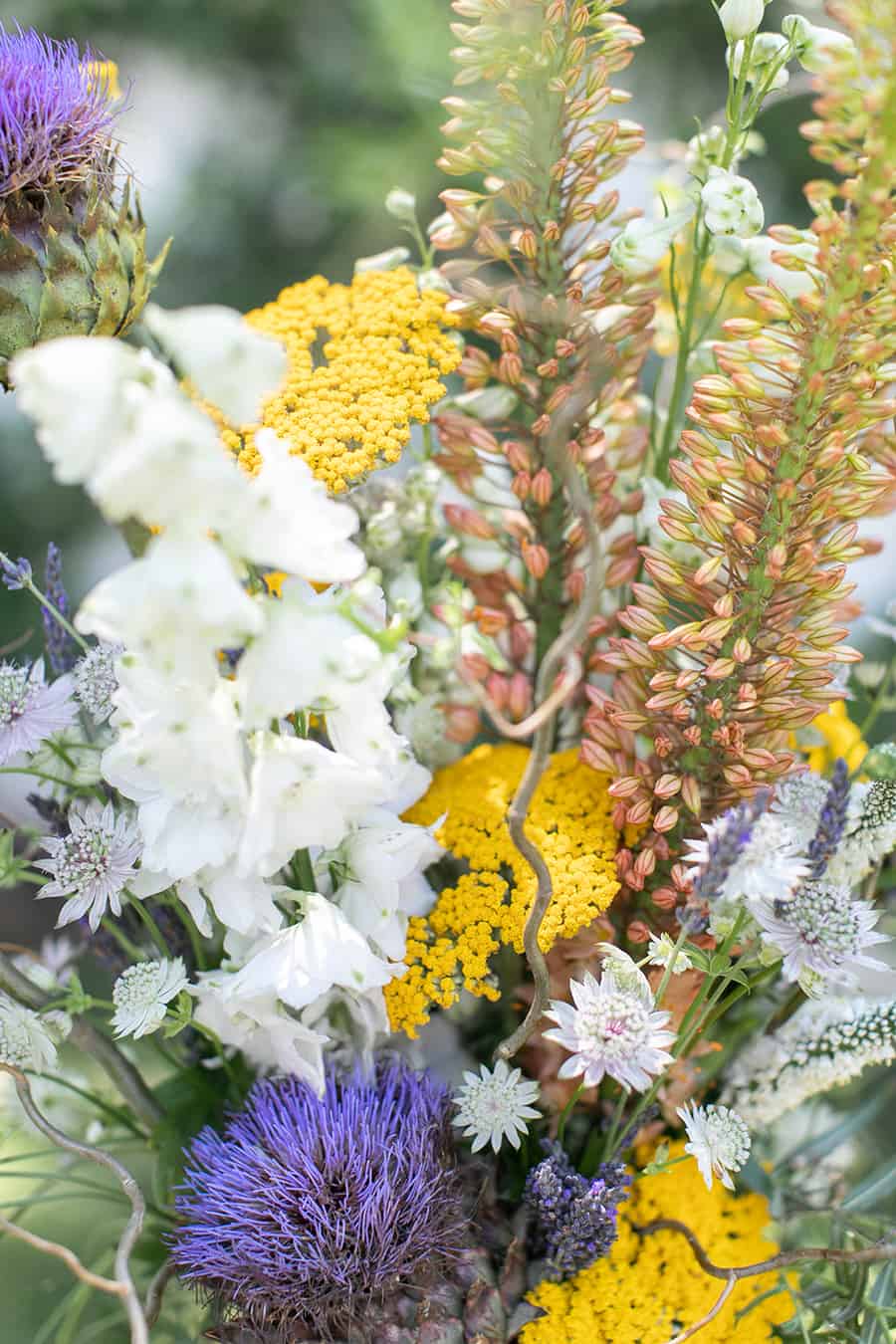 Yellow and purple flowers on bar cart