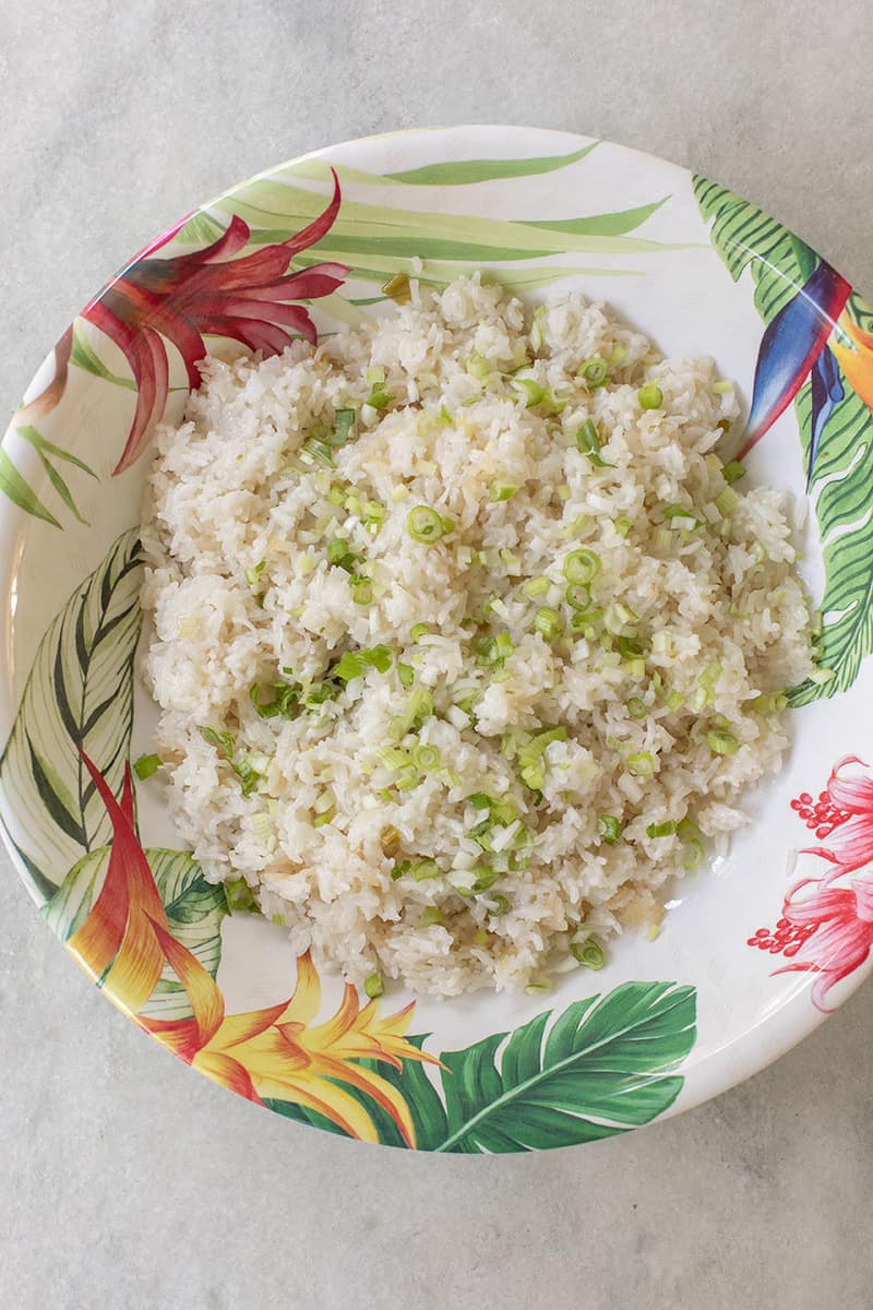 overhead of coconut rice with scallions.