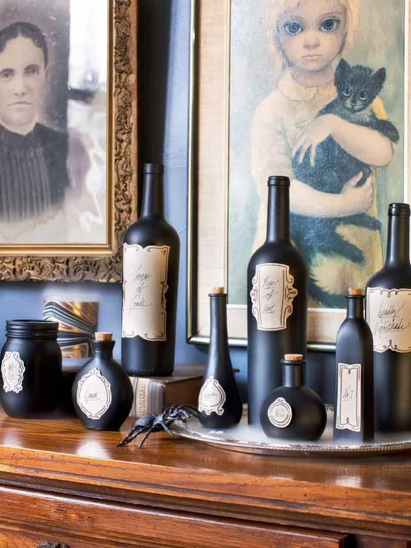 Black bottles with special labels for Halloween