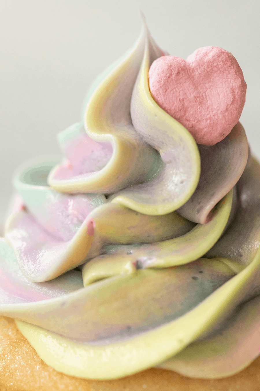 Colorful buttercream frosting with a lucky charms heart