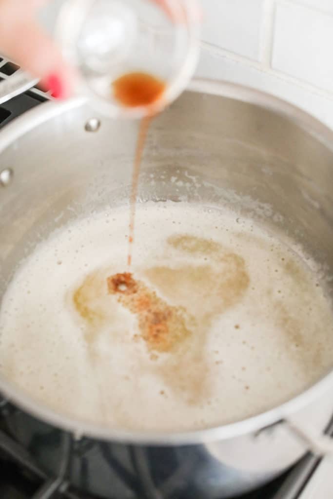 pouring vanilla extract