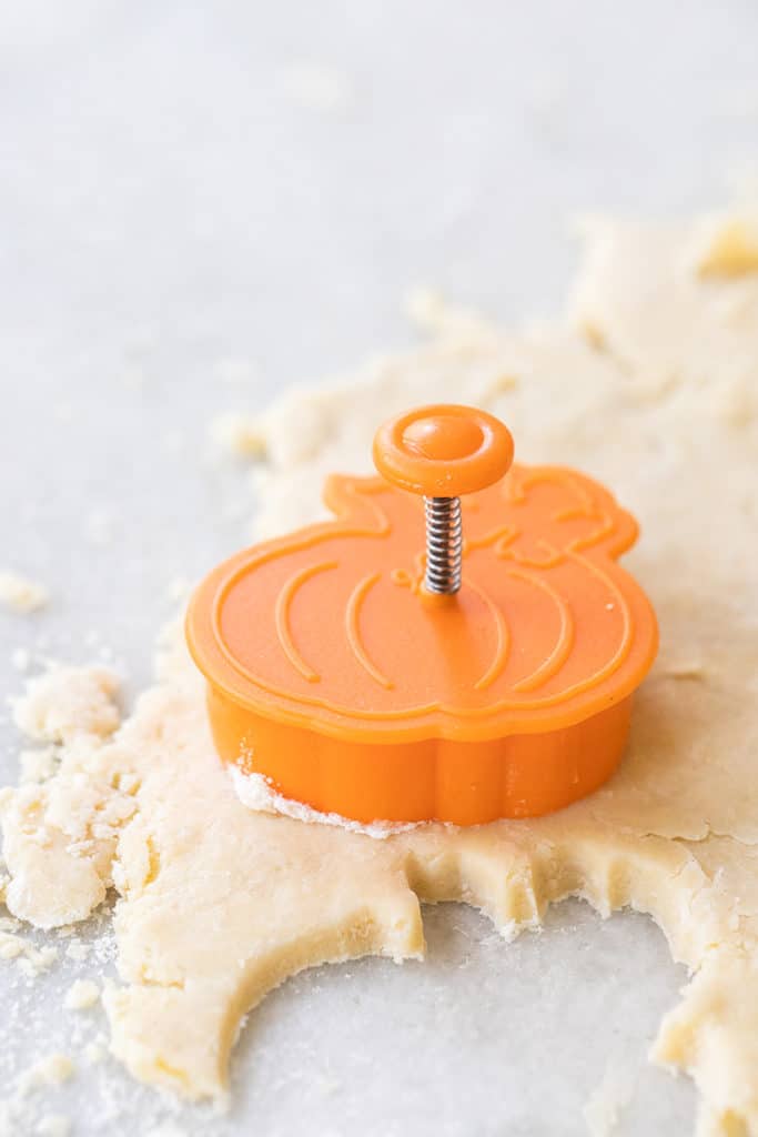 Pumpkin pie crust cutouts to go on the top of the pie.