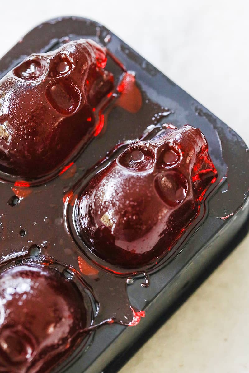 Skull jello shots in a black jello mold.