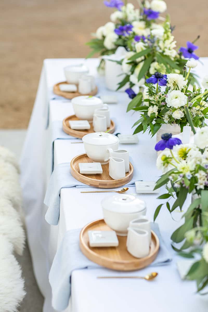 tea party bridal shower with flowers, linens and decorations.