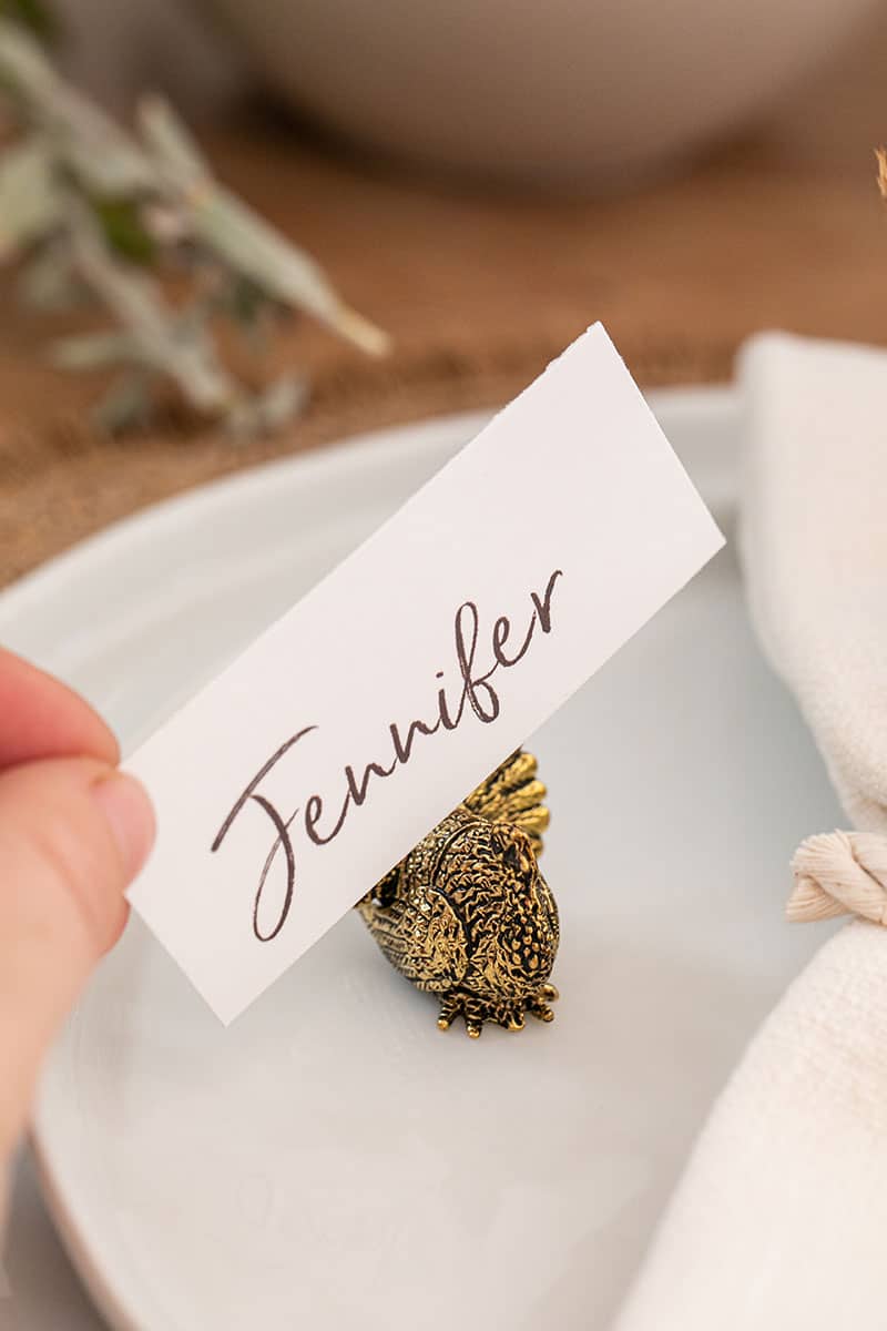 Adding a name card into a gold turkey holder