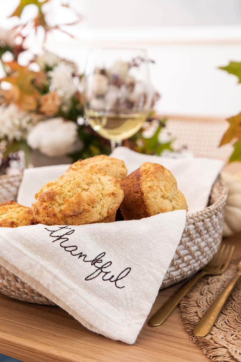 Cornbread muffins in a basket.