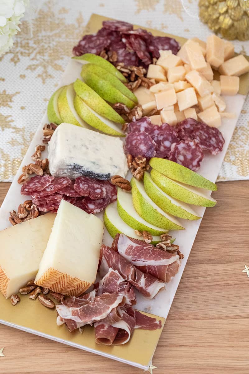 Meat and cheese board with pears from Harry & David.