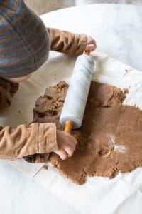 rolling out gingerbread dough