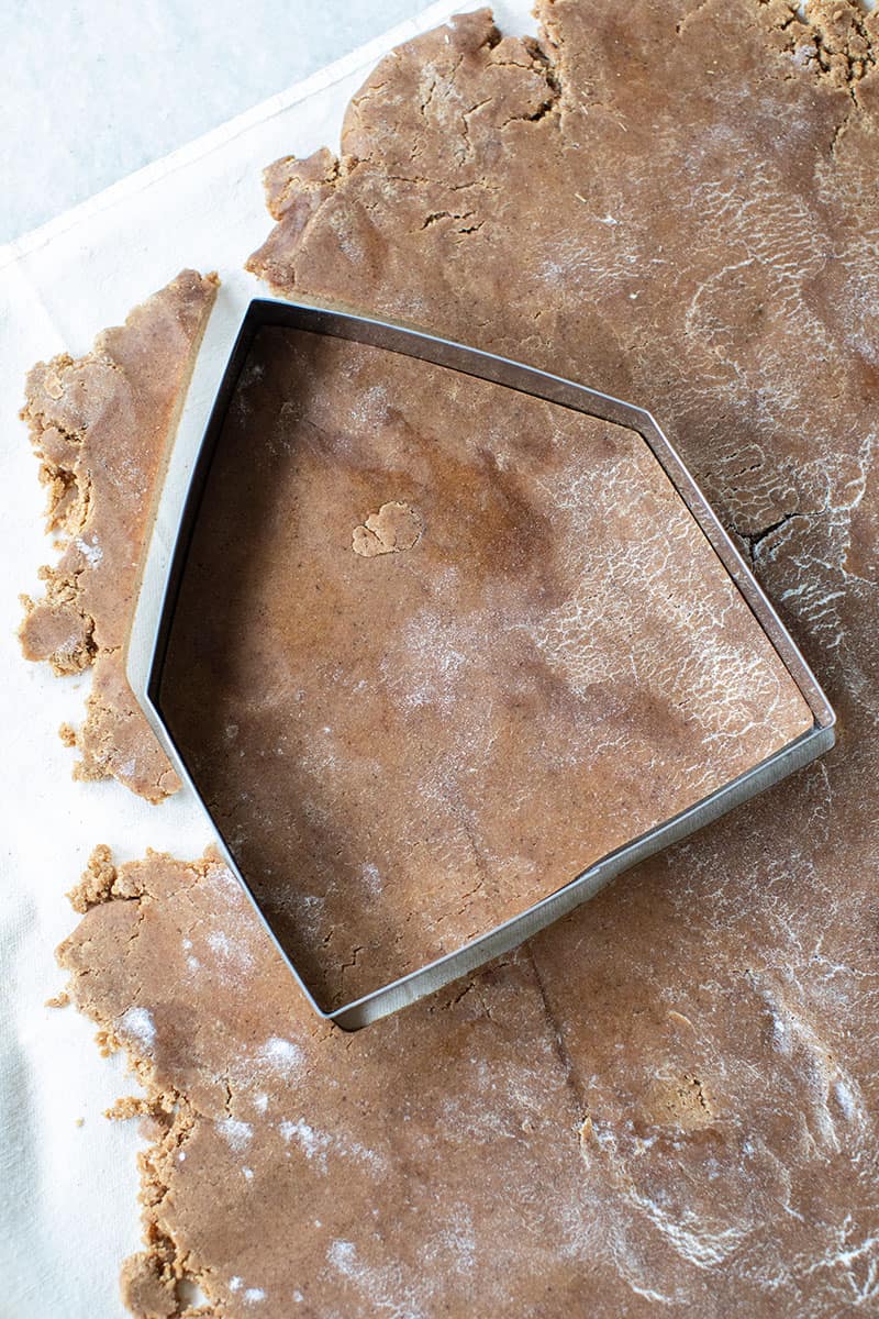 Gingerbread dough and cookie cutter.