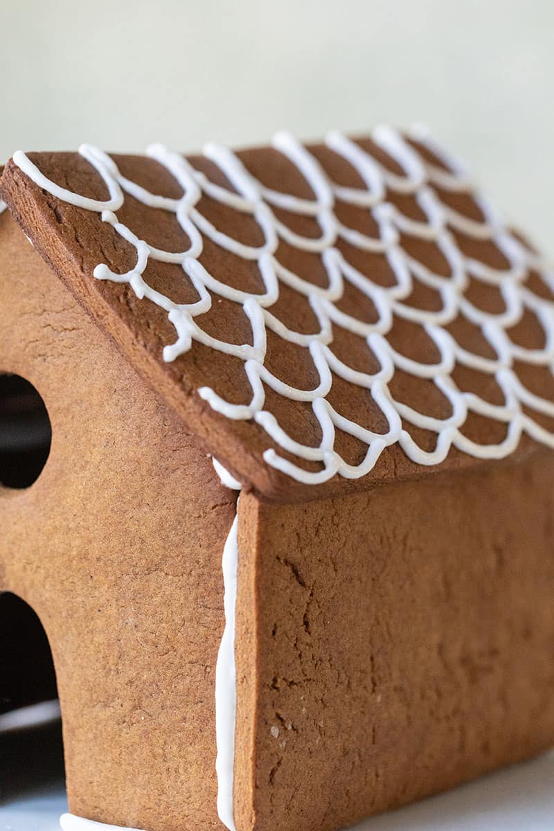 Royal icing detail on a gingerbread house roof. 