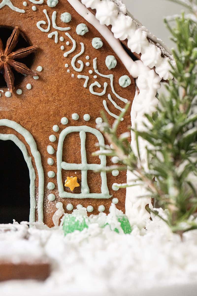 Frosting on a decorated gingerbread house.