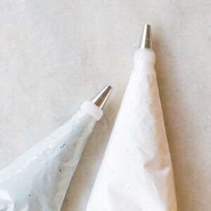 Gingerbread house icing in piping bags.