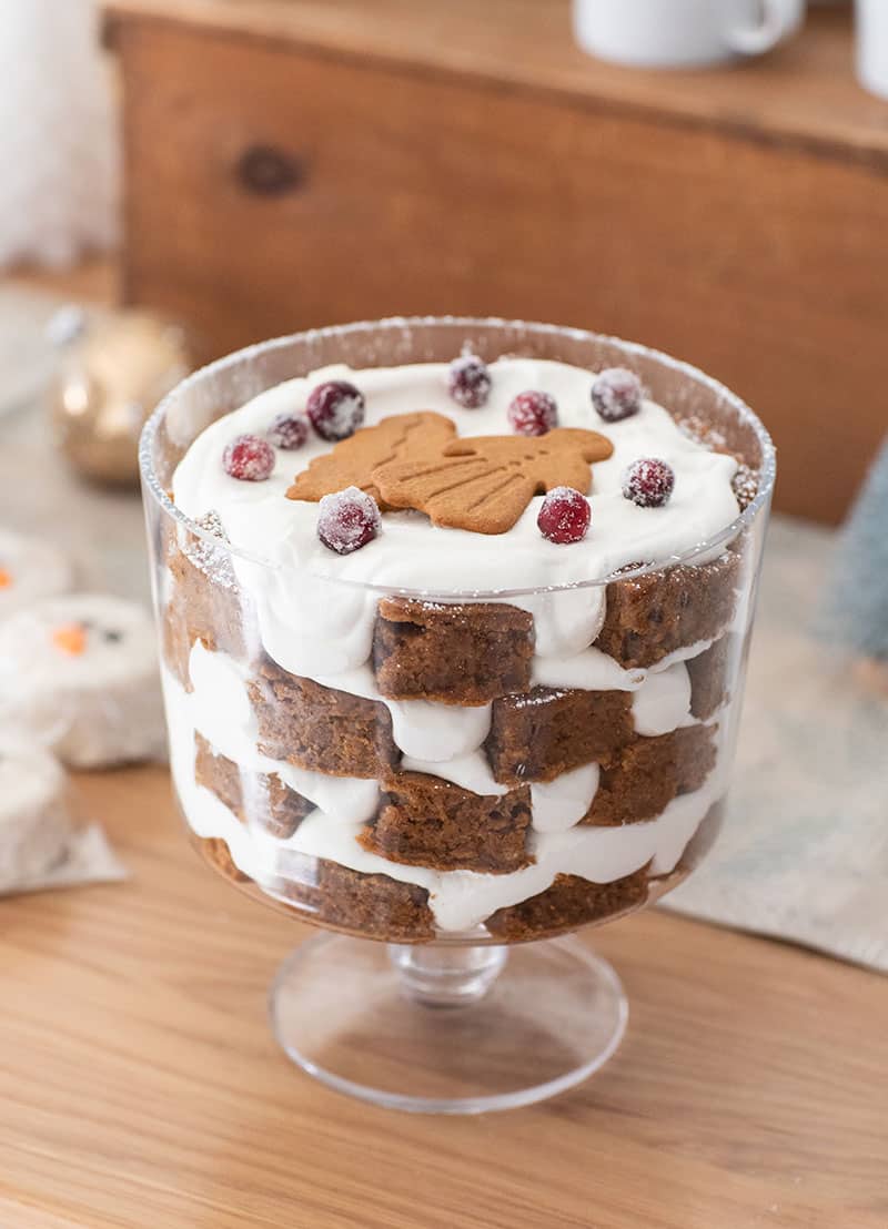 Gingerbread trifle with whipped cream and cookies. 