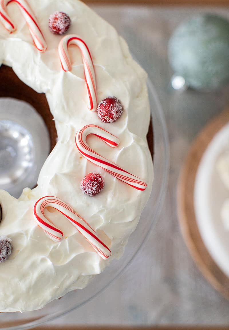 Gingerbread cake with whipped cream and candy canes.