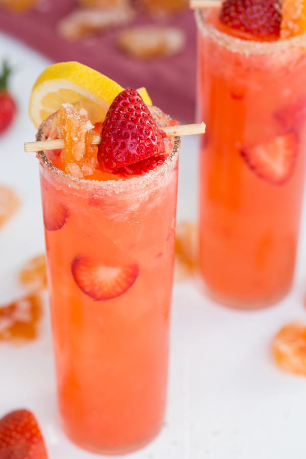 Strawberry and grapefruit collins with candied grapefruit, strawberries and lemons. 