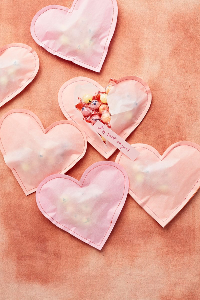 Paper hearts filled with candy for the perfect Valentine's Day Crafts 