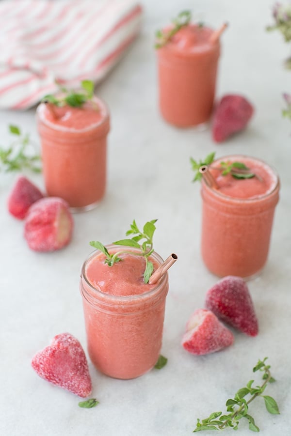 Strawberry froze with copper straws and fresh mint. 