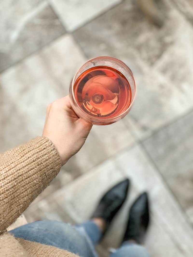 Holding a glass of Rose in Sonoma County