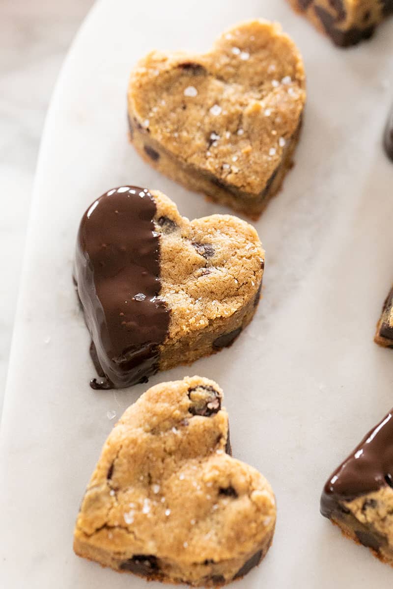 Heart shaped blondies dipped in chocolate.