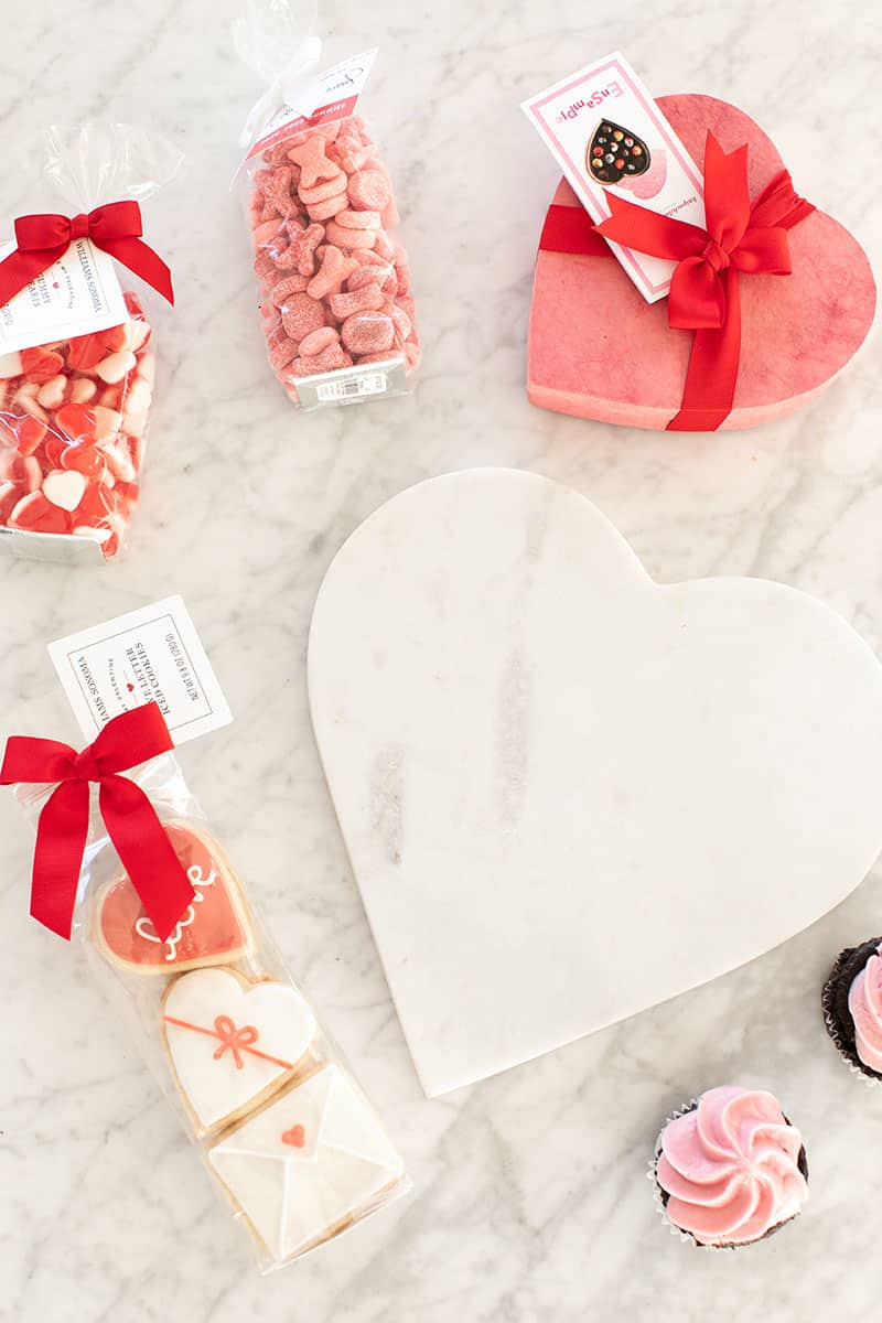 Marble heart shaped platter with cookies and cupcakes to make a dessert platter.