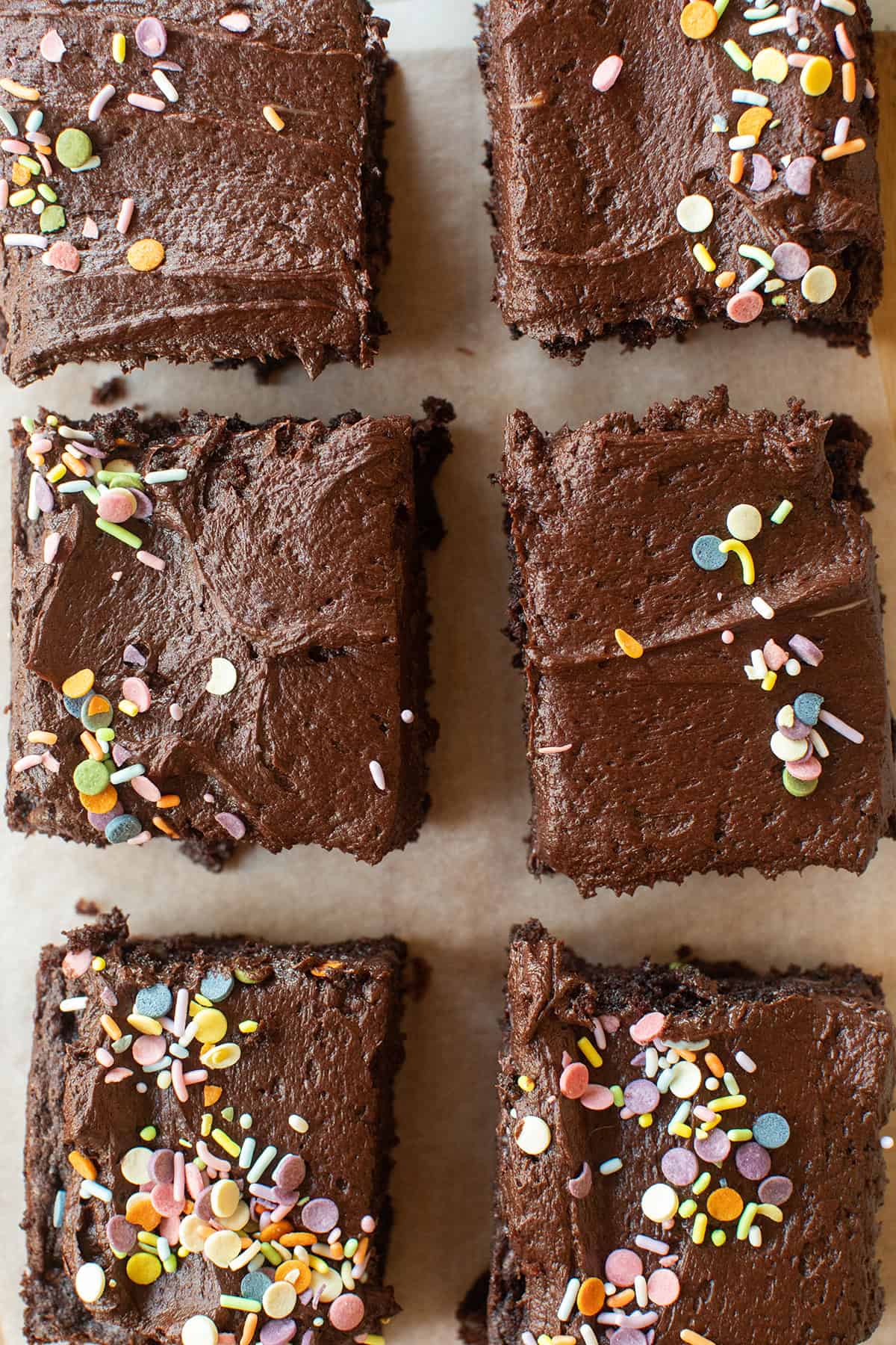 Chocolate Zucchini cake recipe with rich chocolate frosting and sprinkles.