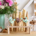 ice cream bar with ice cream cones and colorful flowers