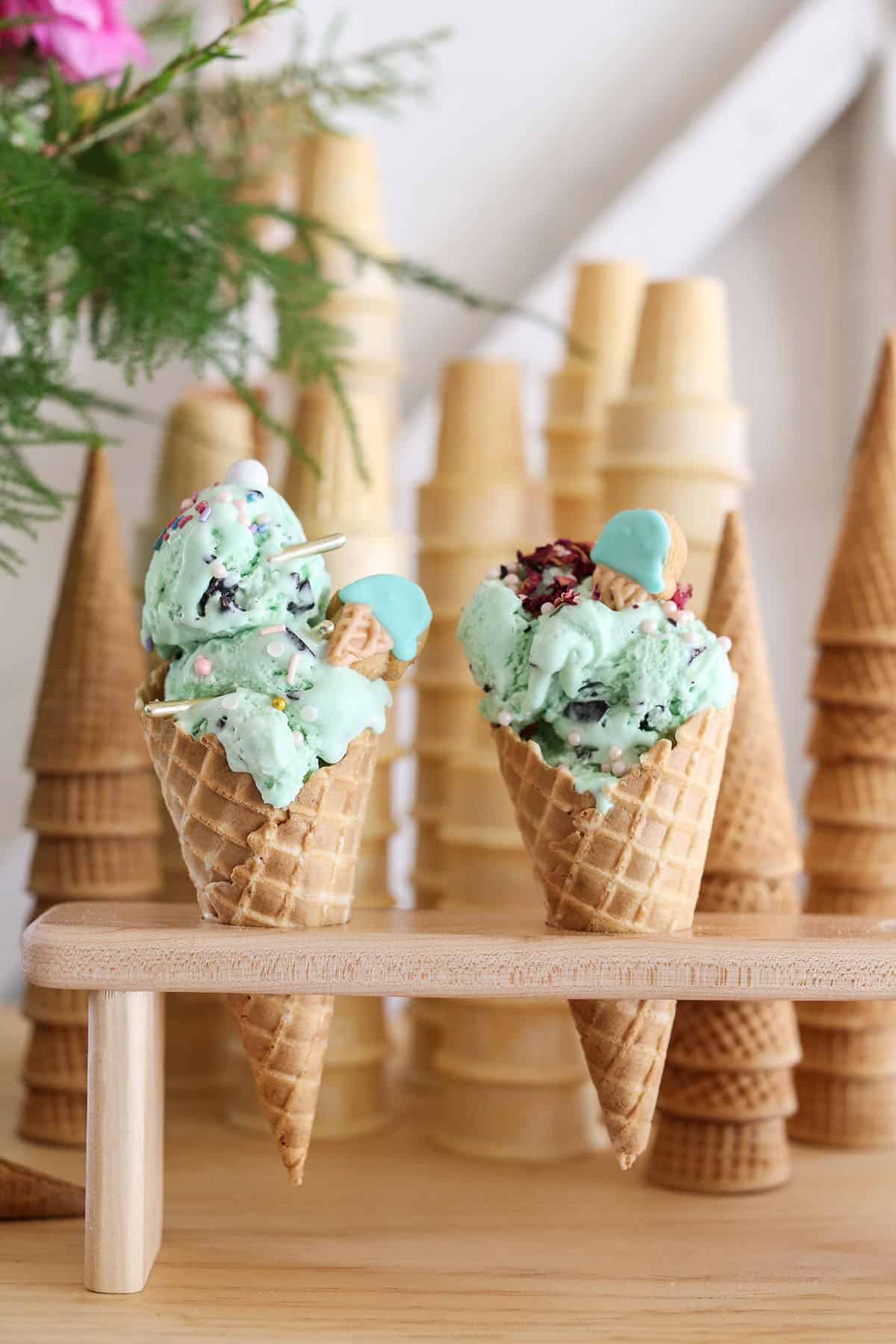 Ice cream cones in a wooden holder on a bar