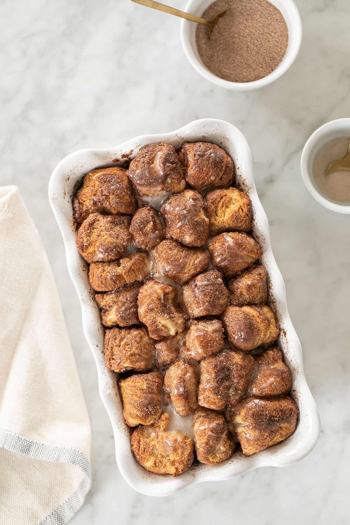 Easy monkey bread in a loaf pan made with biscuit dough, butter and cinnamon and sugar.