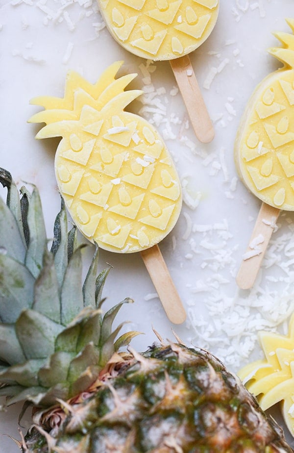 Pineapple popsicle in the shape of a pineapple.
