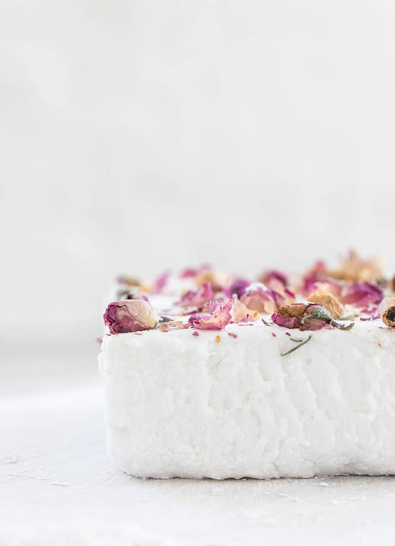 Homemade marshmallow sheet with dried rose petals over the top. 