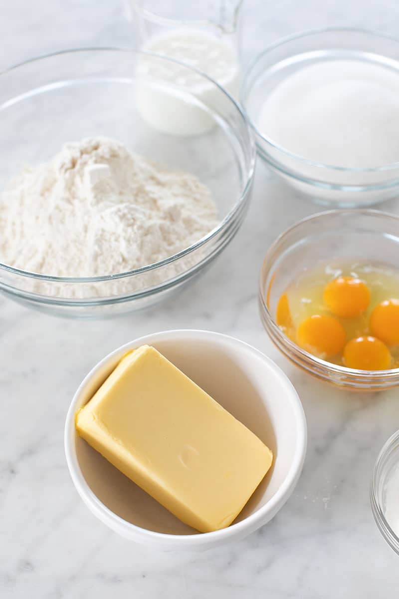 Butter, eggs and flour on a marble table. 
