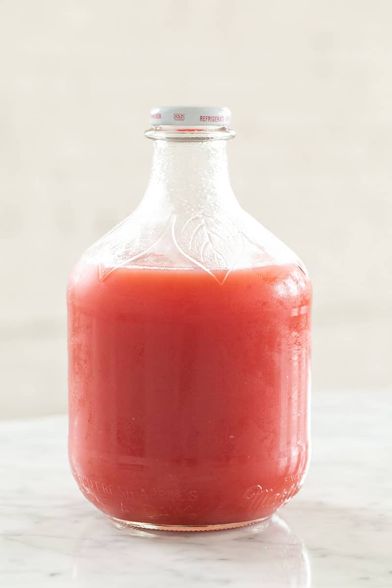 Watermelon drink in a large glass jar.