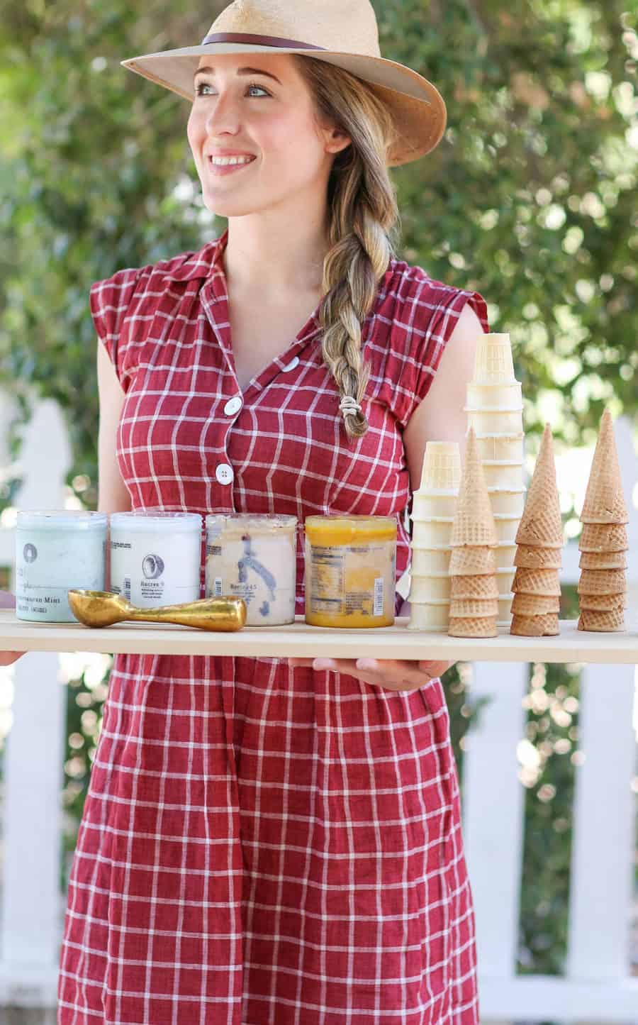 Eden Passante holding a tray of ice cream and cones.