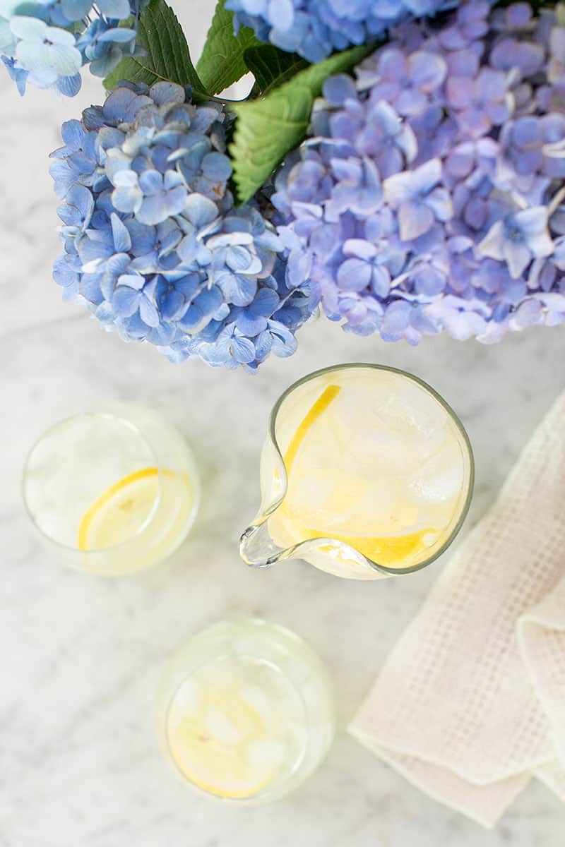 simple homemade lemonade recipe on a marble table
