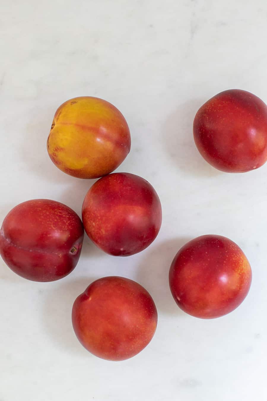 Apriums on a marble table. 