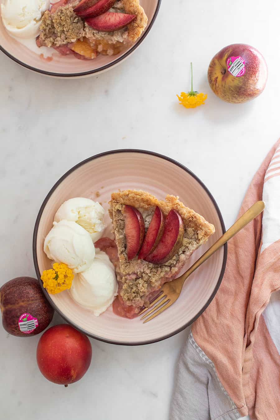 Slice of plumcot and aprium pie recipe.