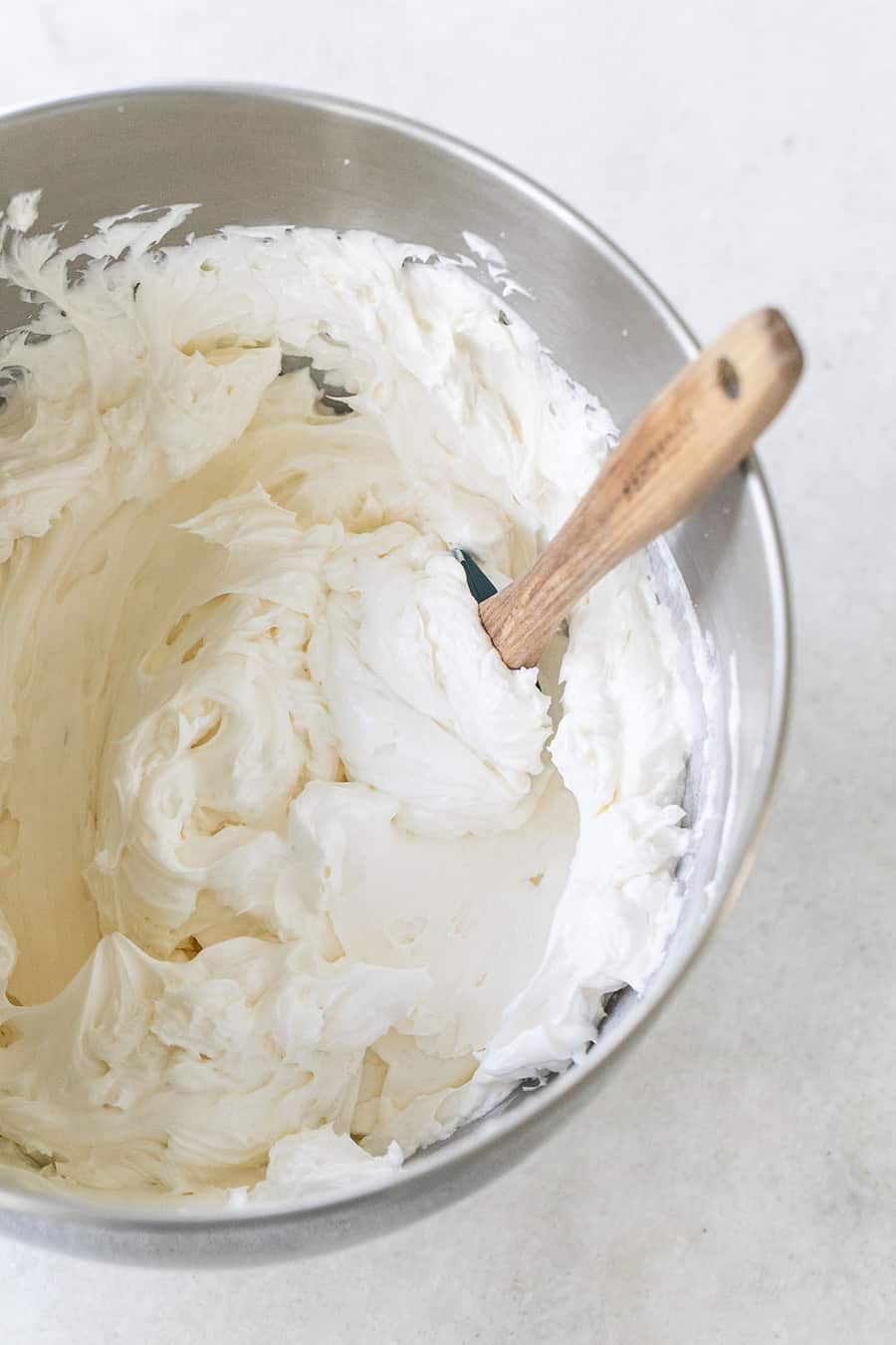 Swiss Meringue Buttercream Frosting in a mixing bowl.