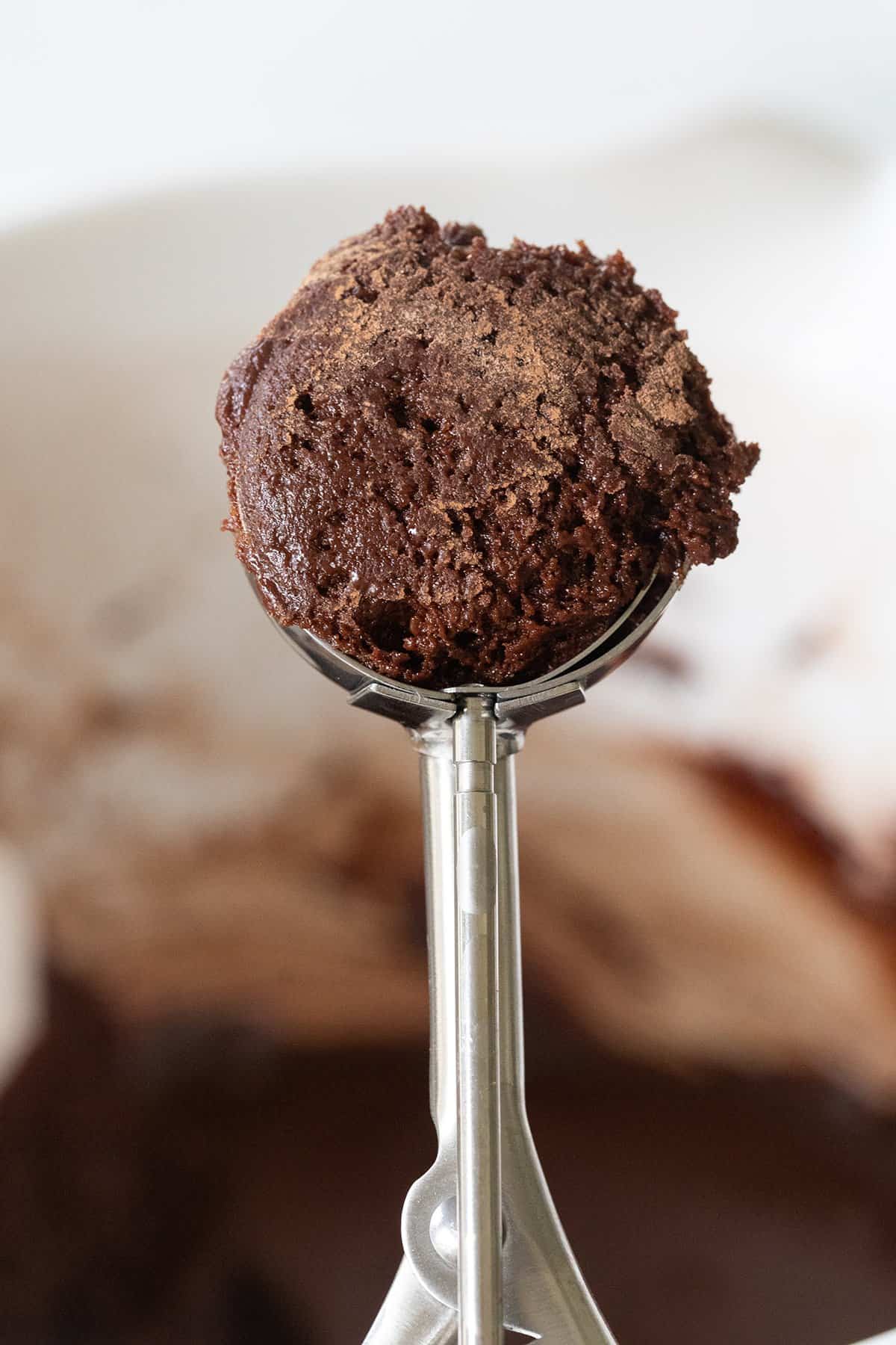 cookie scooper with chocolate cookie dough 