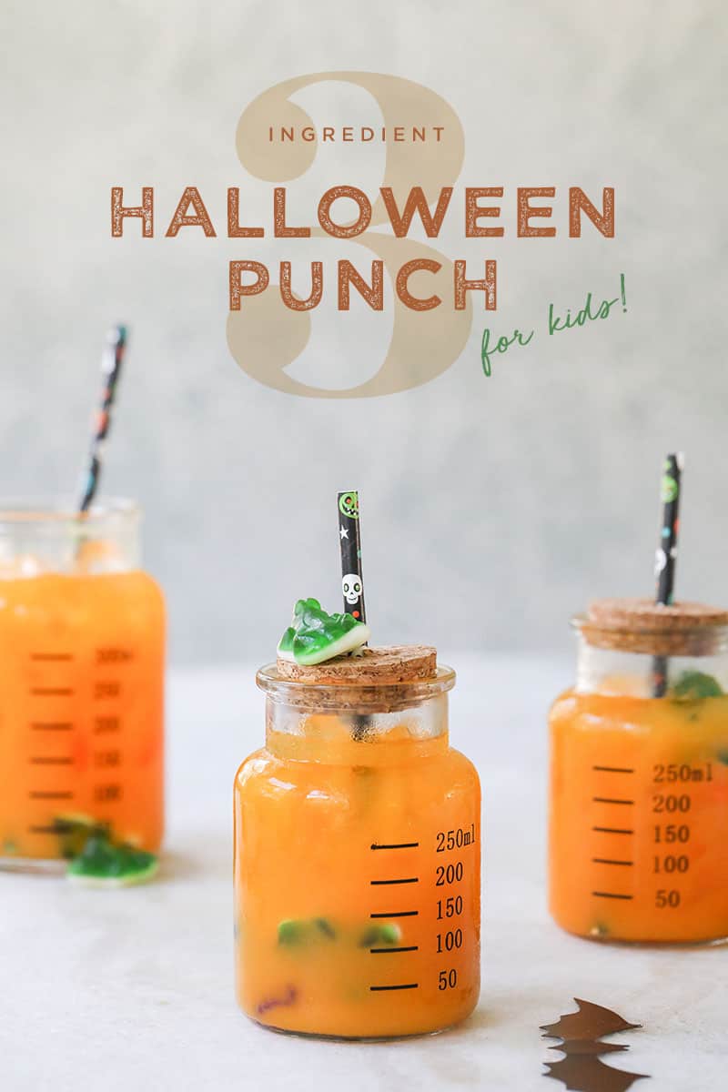 Halloween punch for kids in jars with gummies.