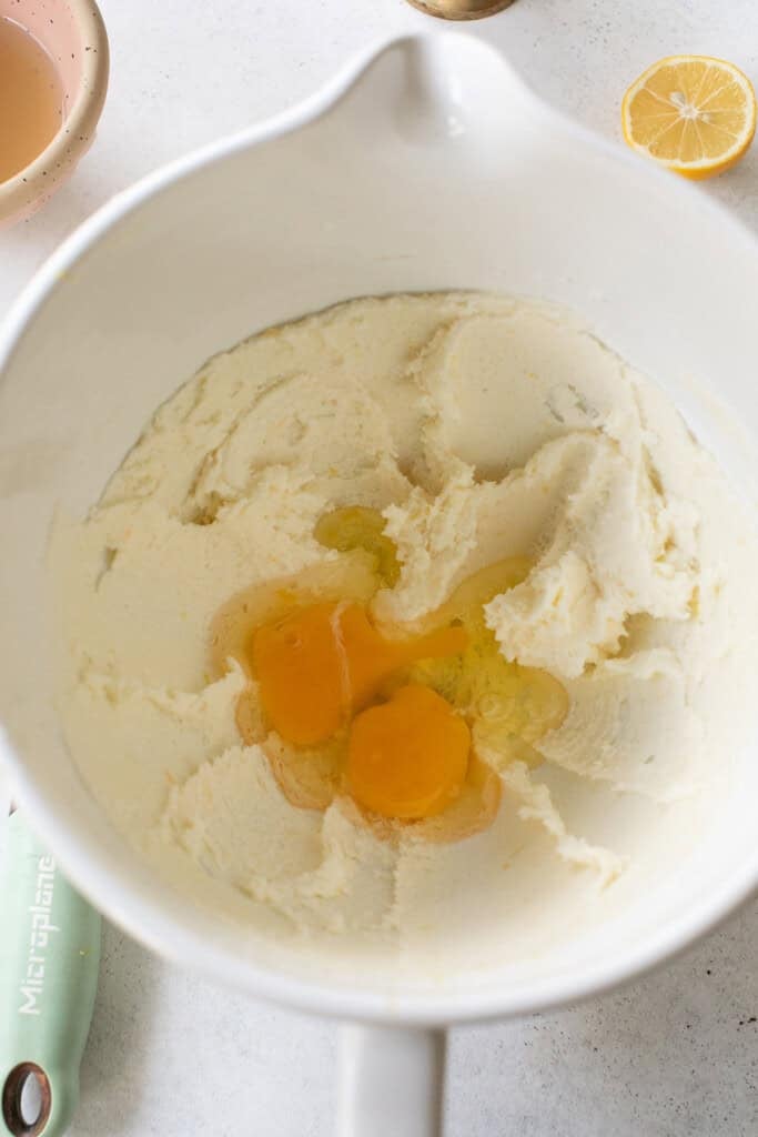 Lemon loaf batter in a Kitchen Aid bowl to make moist lemon loaf.