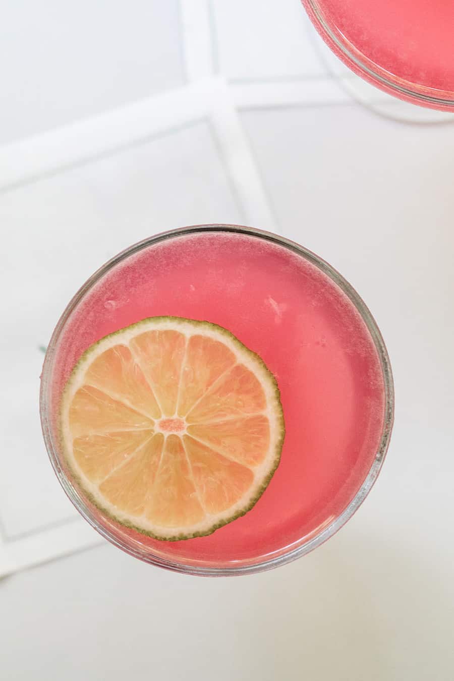 Cosmopolitan drink overhead picture with lime.