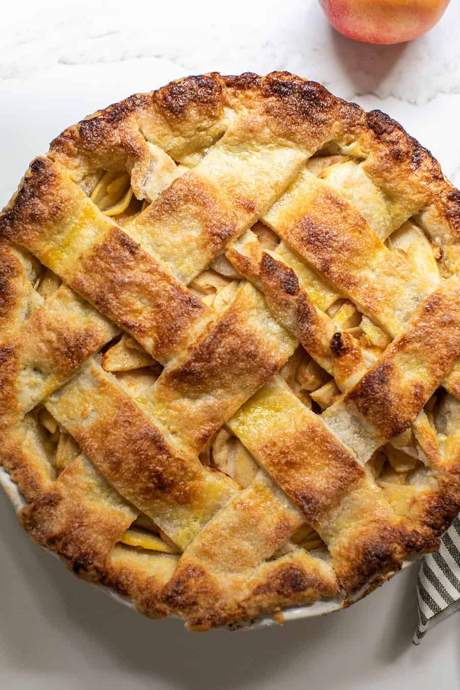 Homemade apple pie recipe with a golden brown pie crust top