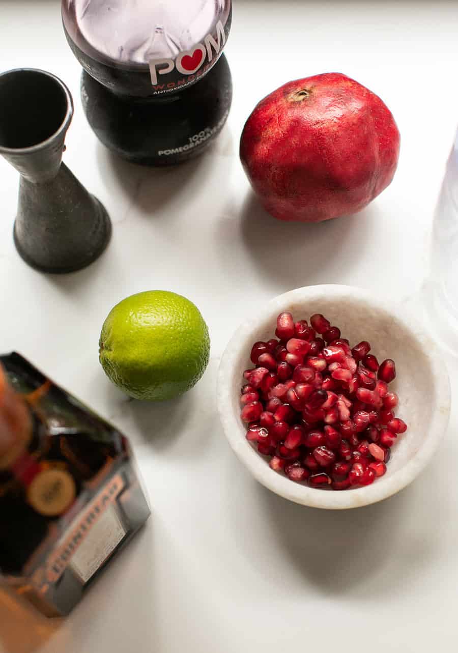 Ingredients to make a pomegranate margarita 