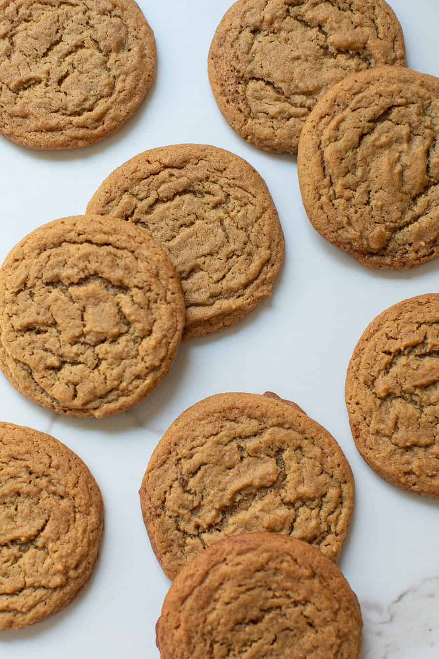 Chewy ginger cookies on a marble table